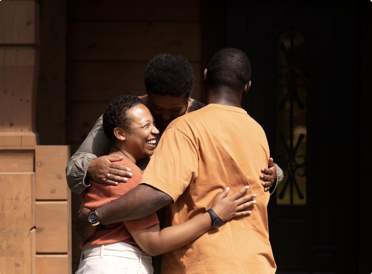 Two people embracing in support